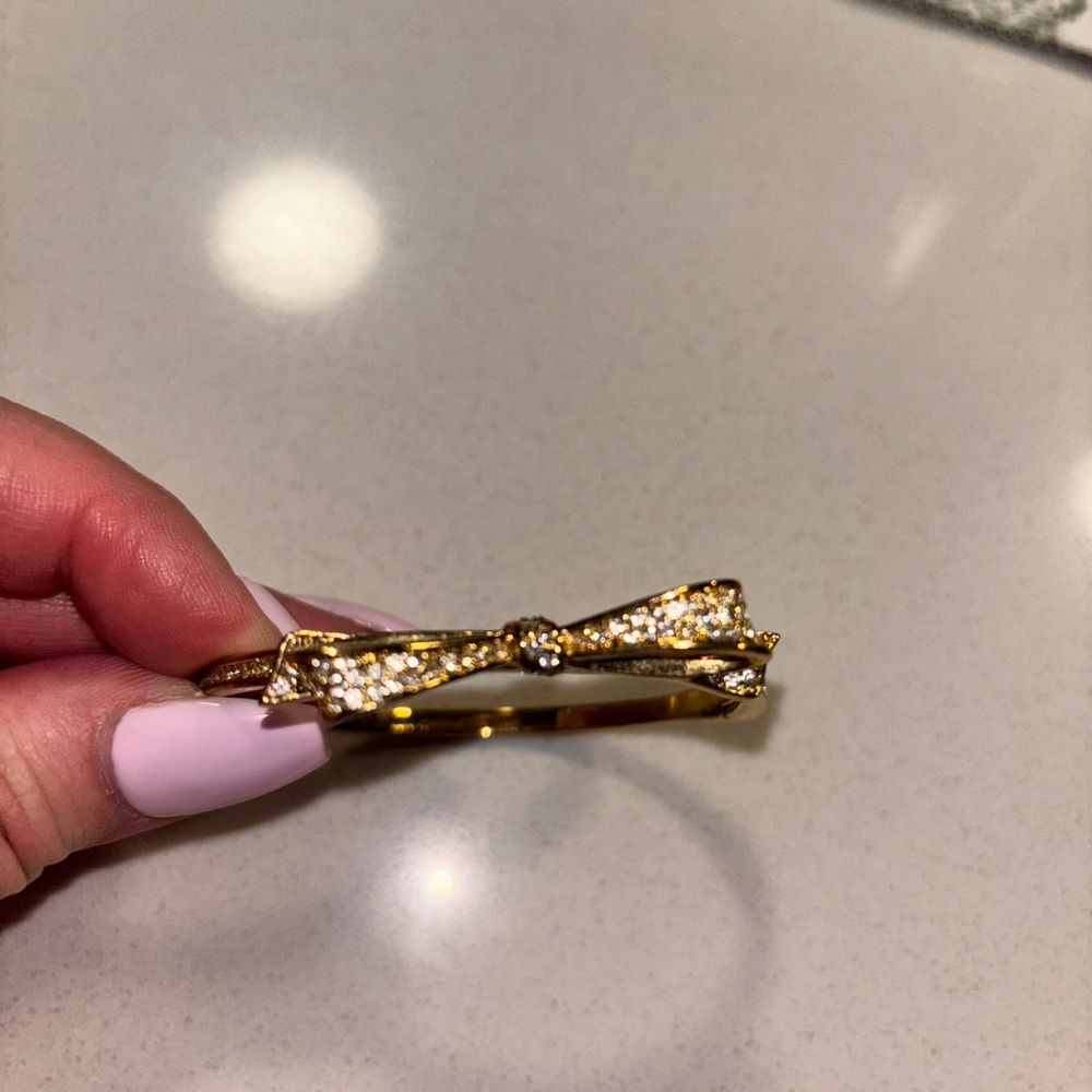 Kate Spade Gold Bow Bracelet with Rhinestone Embellishments